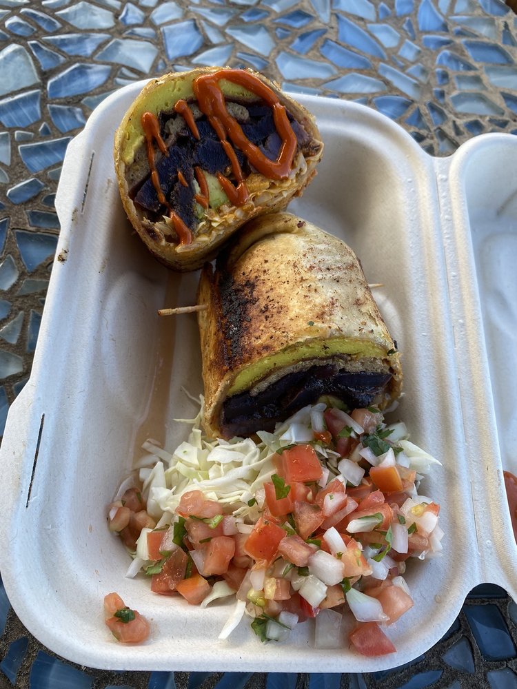 Rainbow Kitchen + Rebel Tonics logo